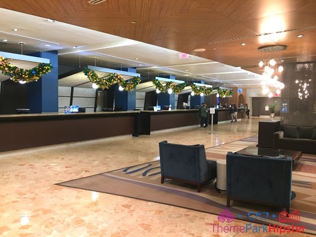 Disney Contemporary Resort Lobby. Keep reading to get your perfect Disney Resort Christmas Decorations Tour!