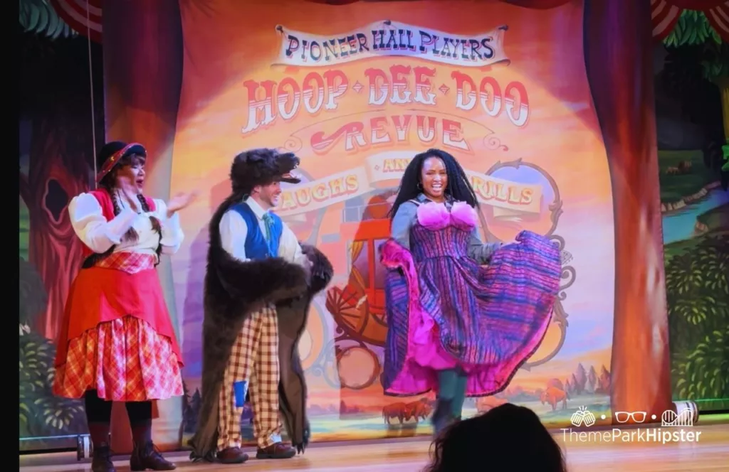Disney Wilderness Lodge Resort NikkyJ performing on stage at Hoop Dee Doo Musical Revue. Keep reading to find out all you need to know about Disney World Mobile Order Service.